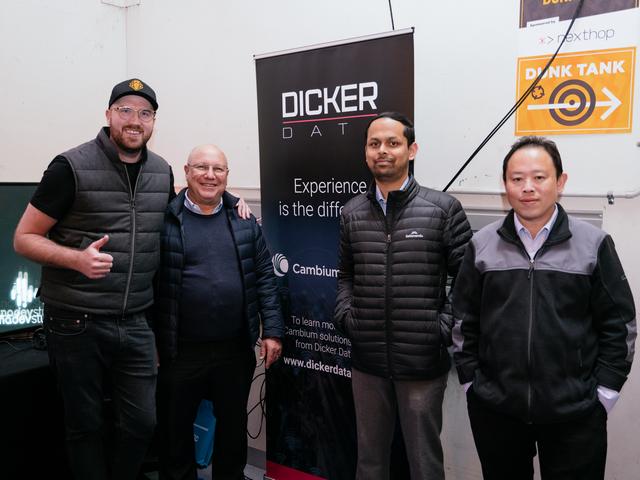 Pentanet founder Stephen Cornish with three men from Dicker Data